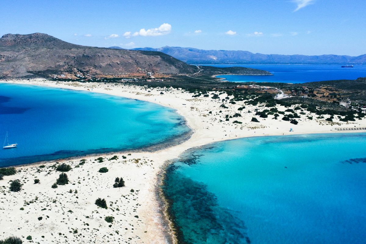 The pink-tinged sand and shallow lagoon at Elafonisi beach