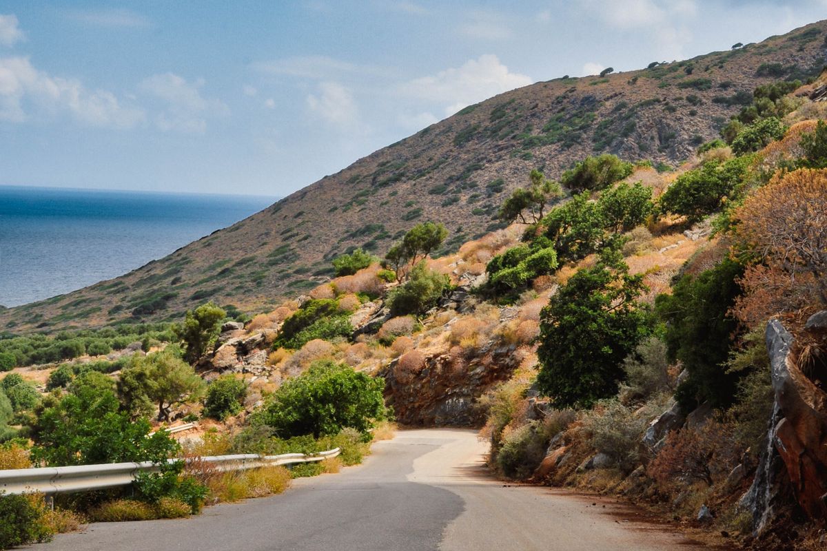 A coastal road winding along the mountains of Crete